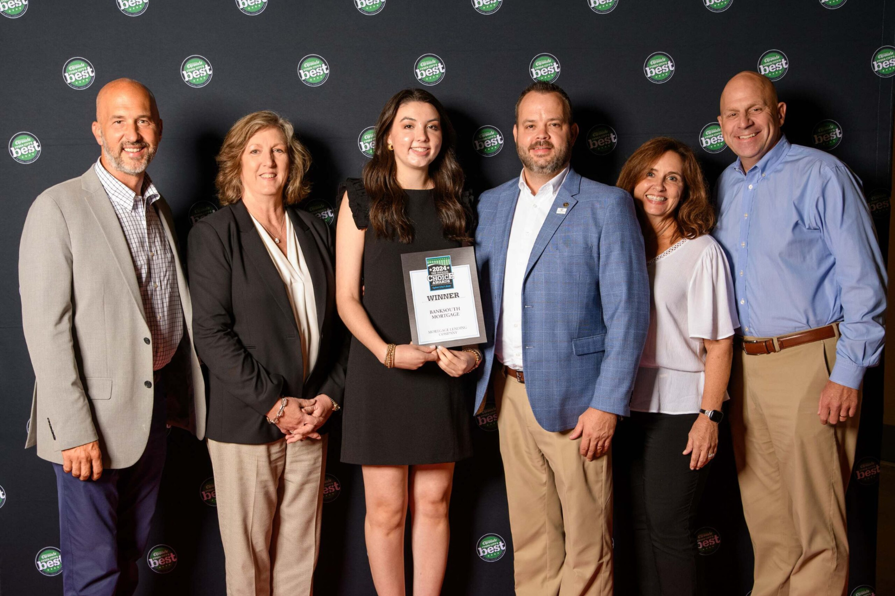 Group photo of BankSouth Mortgage employees celebrating at the 2024 Cyber City Awards Ceremony. From left to right: Mac Cregger, Debra Taylor, Riley Rabun, Alan Rabun, Cyndi Eber, and David Godwin.